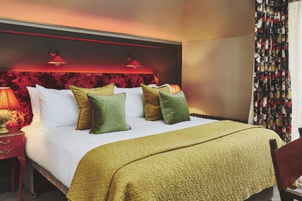 Intimate Room King Size Bed With Red Velvet Backboard